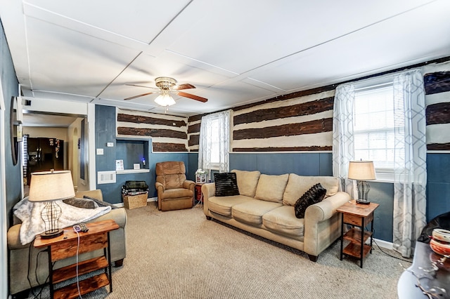 living room with carpet floors and ceiling fan