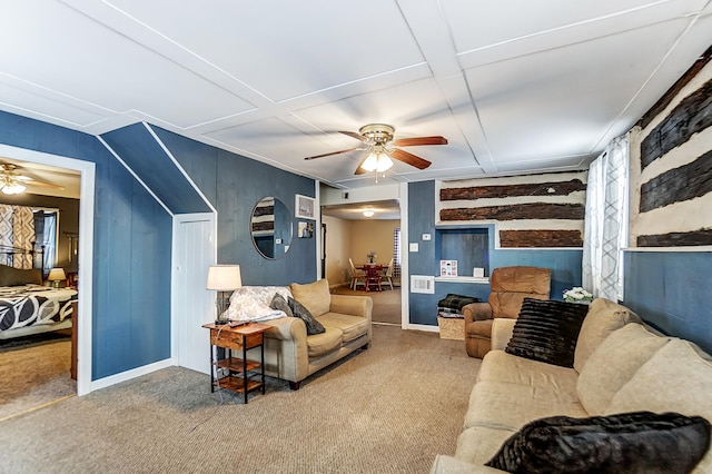 living room featuring carpet and ceiling fan