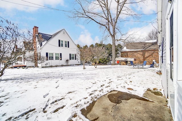 view of snow covered property