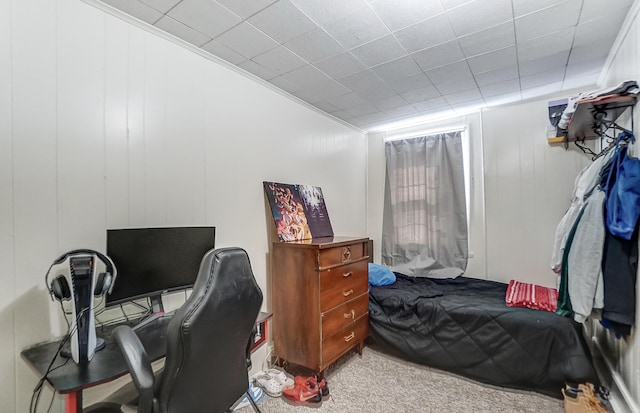 carpeted bedroom with ornamental molding