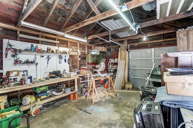 garage with a workshop area