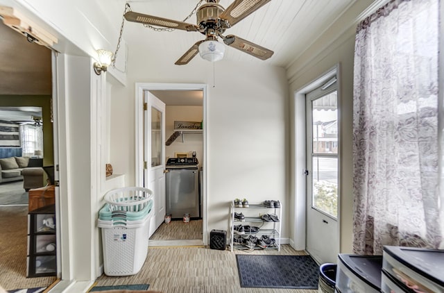 interior space featuring ceiling fan, light hardwood / wood-style floors, and a wealth of natural light