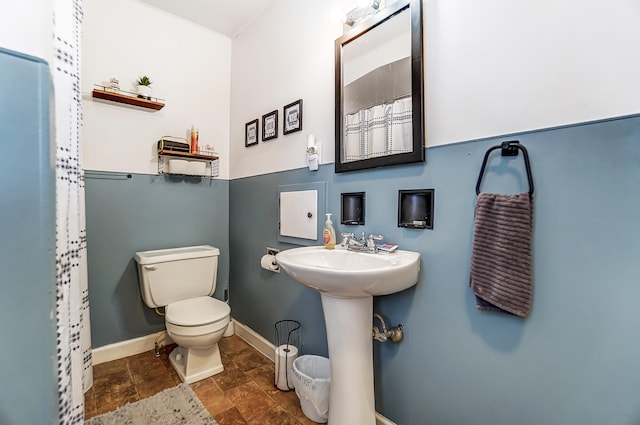 bathroom with sink and toilet