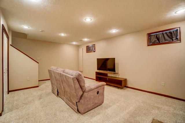 living area featuring baseboards, carpet, and recessed lighting
