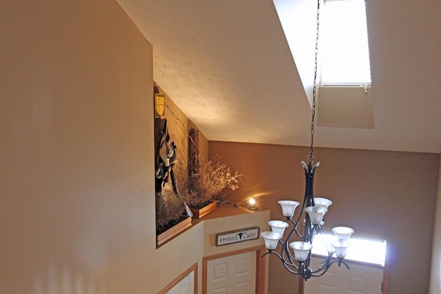 609 Lambert Dr, Piqua, OH 45356 - interior details featuring a chandelier