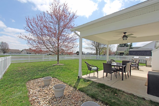 609 Lambert Dr, Piqua, OH 45356 - view of yard featuring a fenced backyard, a ceiling fan, and a patio area