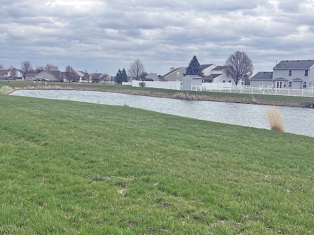 609 Lambert Dr, Piqua, OH 45356 - water view with a residential view and fence