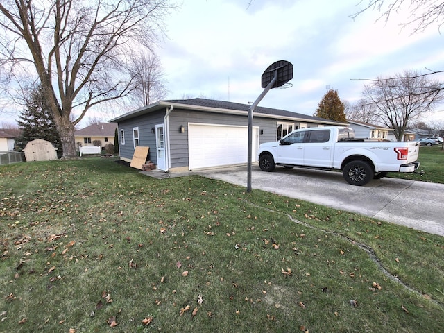 view of home's exterior featuring a garage and a yard