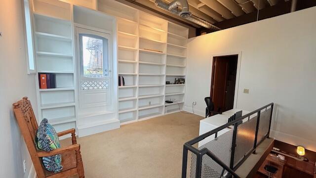 home office featuring carpet flooring