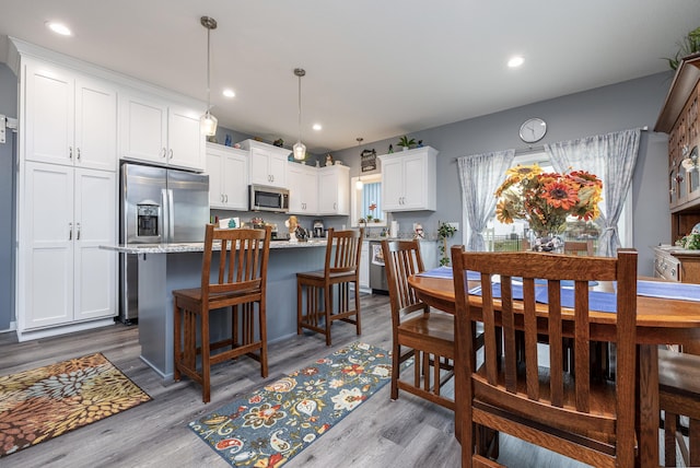 255 N Pine St, Lakeview, OH 43331 - dining space with wood finished floors and recessed lighting