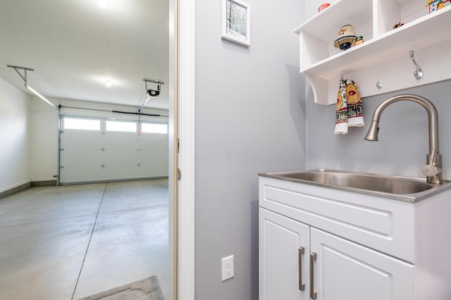 255 N Pine St, Lakeview, OH 43331 - interior space with a sink and a garage