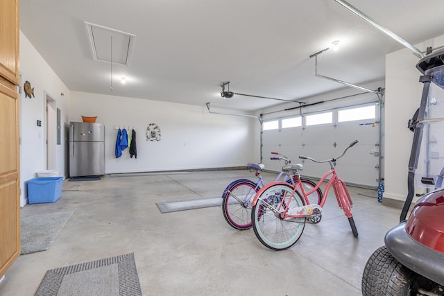 255 N Pine St, Lakeview, OH 43331 - garage featuring freestanding refrigerator