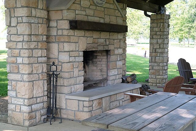 255 N Pine St, Lakeview, OH 43331 - exterior view of an outdoor stone fireplace