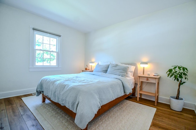1138 Edgebrook Ave, New Carlisle, OH 45344 - bedroom with wood finished floors and baseboards