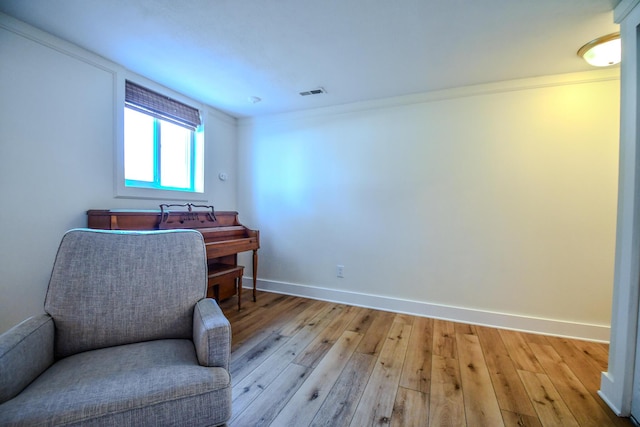 1138 Edgebrook Ave, New Carlisle, OH 45344 - living area with wood-type flooring and baseboards