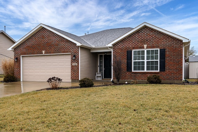 single story home with driveway, brick siding, an attached garage, and a front yard