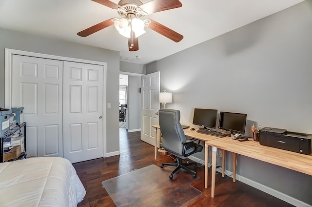 office featuring ceiling fan, baseboards, and wood finished floors