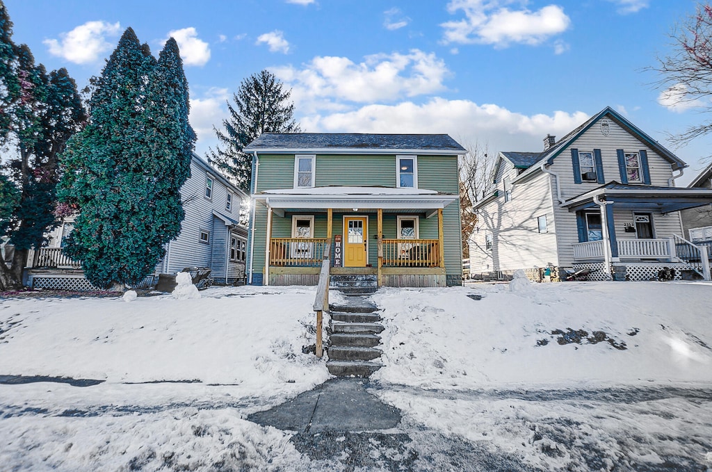 front of property with a porch