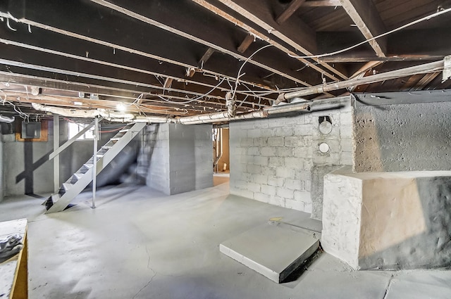 unfinished basement with electric panel