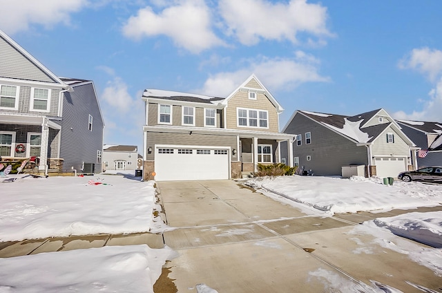 view of front of house with a garage, a porch, and central AC unit