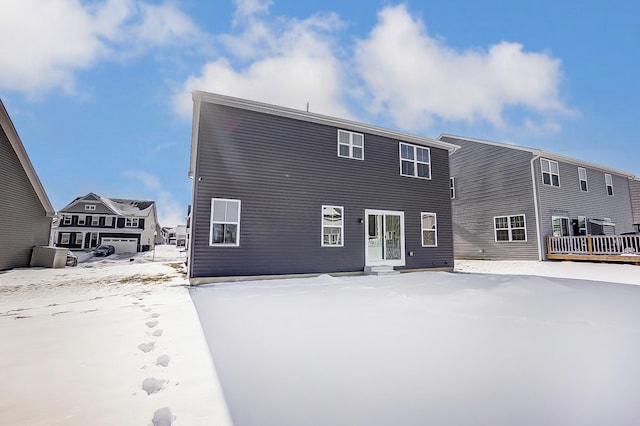 view of snow covered property