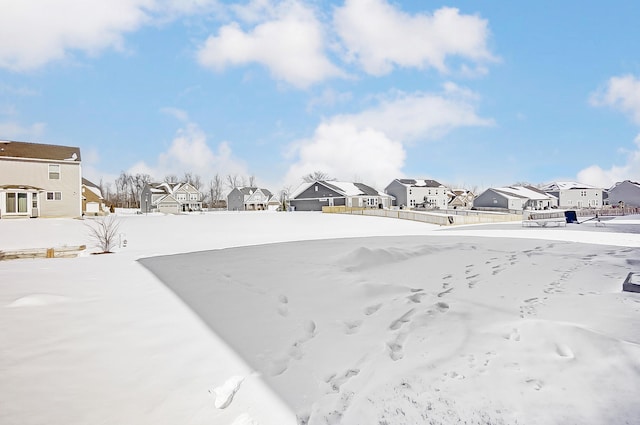 view of yard covered in snow