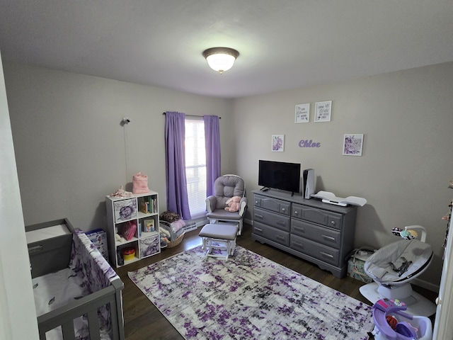 bedroom with wood finished floors