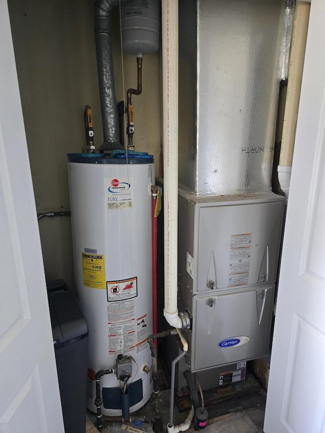 utilities featuring heating unit and gas water heater