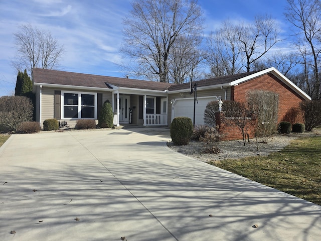 single story home featuring an attached garage, covered porch, driveway, and brick siding