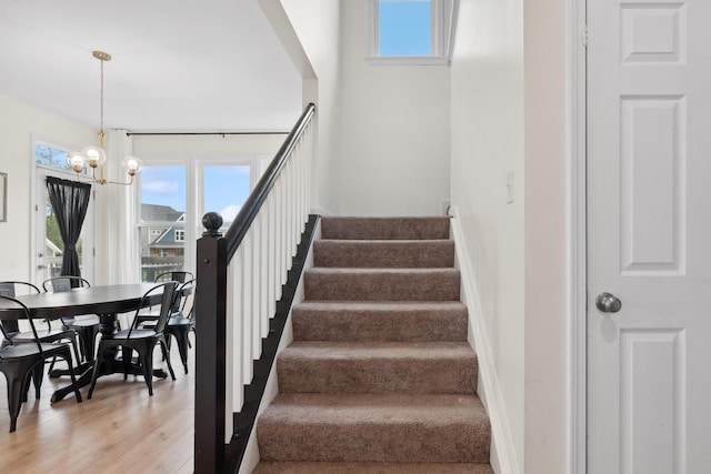 3600 Magnolia Trace Dr, Bellbrook, OH 45305 - stairway featuring a chandelier and wood finished floors
