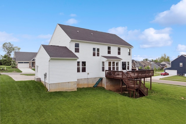 3600 Magnolia Trace Dr, Bellbrook, OH 45305 - back of property featuring a deck, a lawn, stairway, and a shingled roof