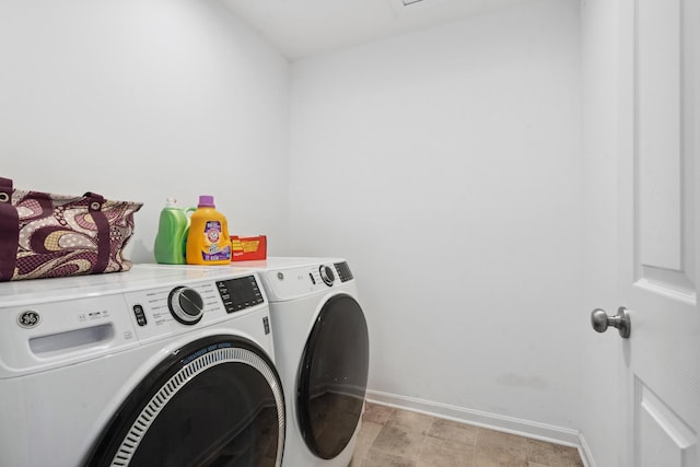 3600 Magnolia Trace Dr, Bellbrook, OH 45305 - washroom with washer and clothes dryer and baseboards