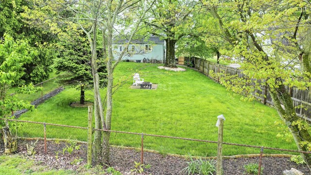 651 Eastern Ave, Bellefontaine, OH 43311 - view of yard with a fire pit
