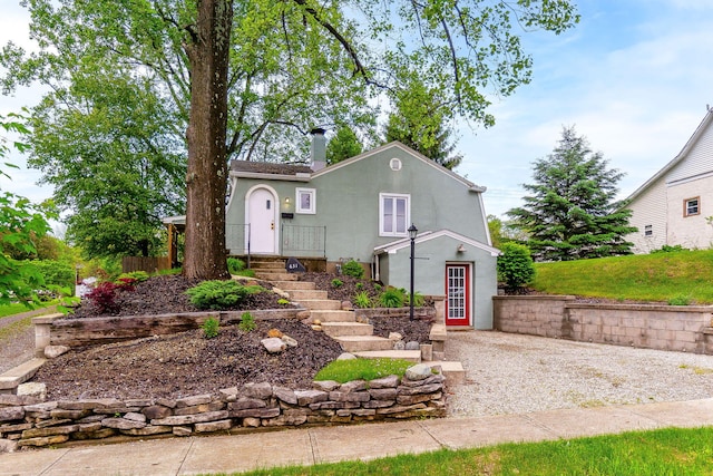 651 Eastern Ave, Bellefontaine, OH 43311 - view of front of house with stucco siding