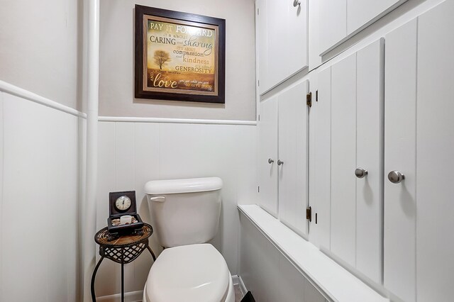 426 School St, Bradford, OH 45308 - bathroom with wainscoting and toilet