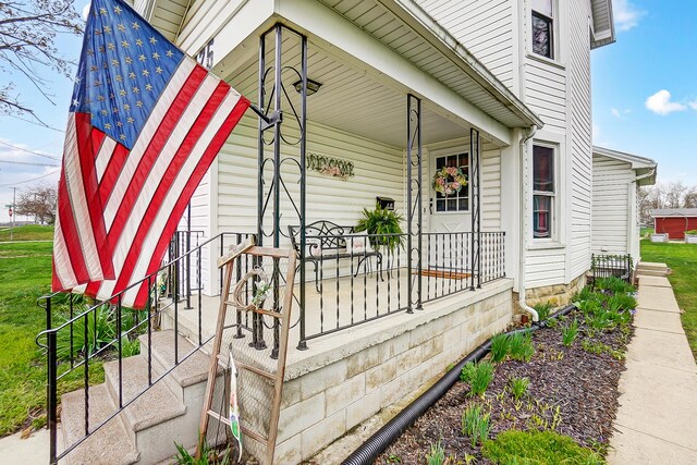 426 School St, Bradford, OH 45308 - exterior space with a porch