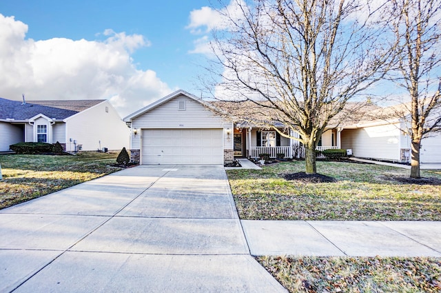 ranch-style home with driveway, a porch, a front yard, a garage, and brick siding