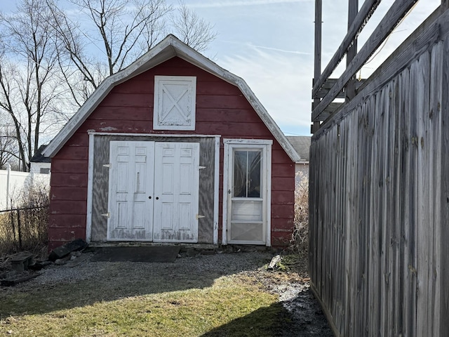 view of outdoor structure with a lawn