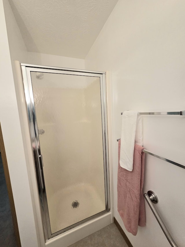 3032 Armsgate Rd Unit 25, Springfield, OH 45503 - full bathroom featuring a stall shower and tile patterned flooring