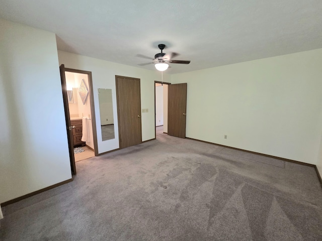 3032 Armsgate Rd Unit 25, Springfield, OH 45503 - unfurnished bedroom featuring carpet, a ceiling fan, and ensuite bath