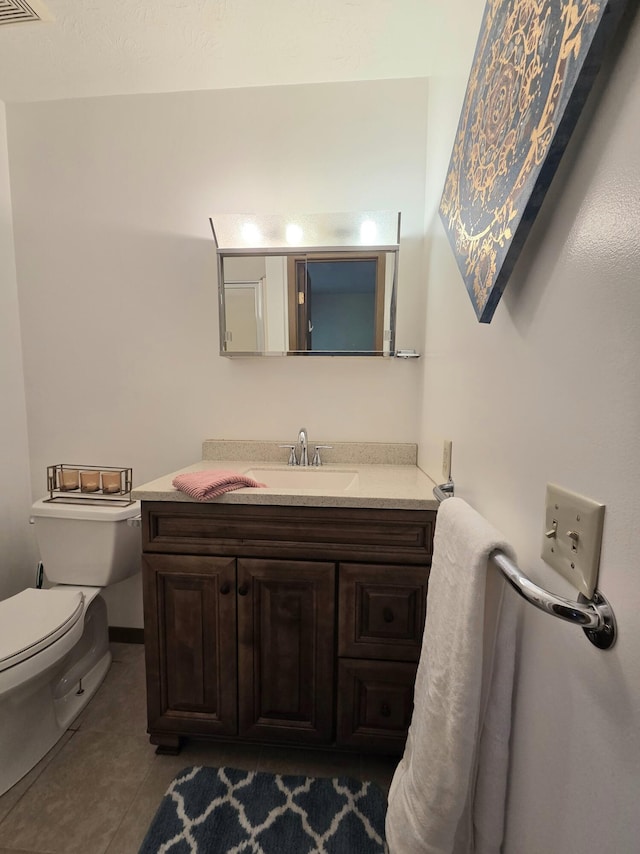 3032 Armsgate Rd Unit 25, Springfield, OH 45503 - half bathroom featuring vanity and tile patterned floors