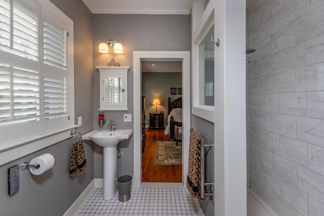 bathroom featuring ornamental molding