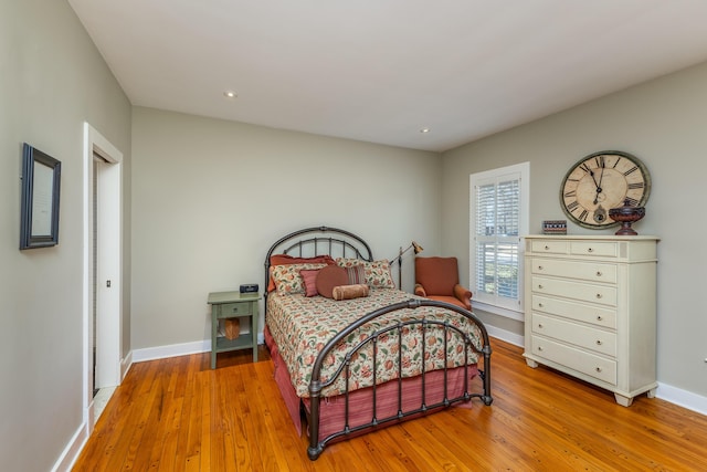 bedroom with light hardwood / wood-style floors