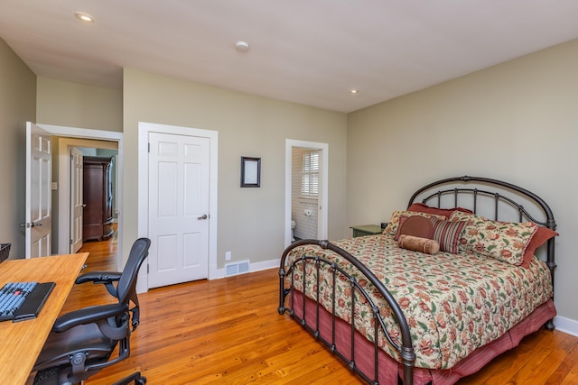 bedroom featuring light wood-type flooring