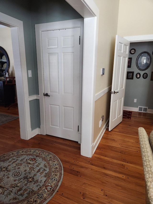 interior space with hardwood / wood-style floors