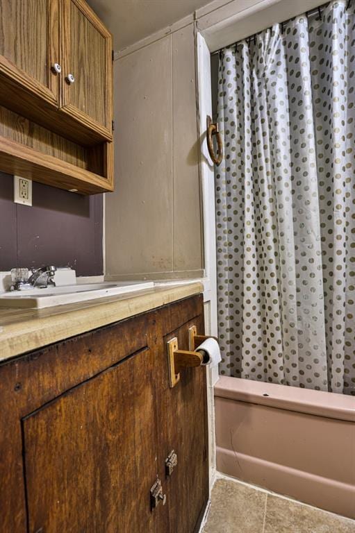 bathroom with tile patterned floors