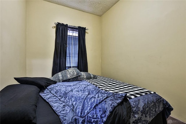 bedroom with a textured ceiling