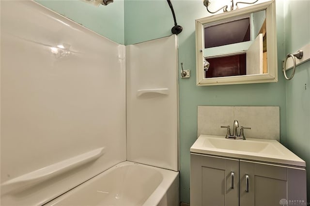 bathroom with shower / bath combination and vanity