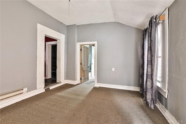 carpeted spare room featuring vaulted ceiling, a baseboard radiator, a textured ceiling, and a healthy amount of sunlight