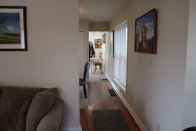 corridor featuring wood-type flooring